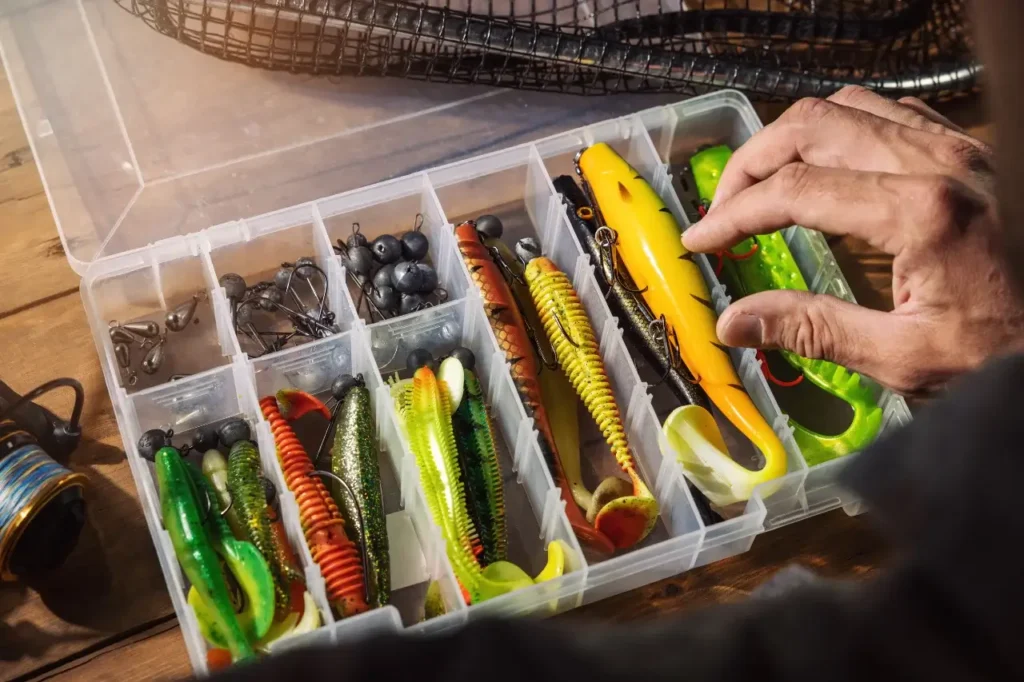 A well-organized fishing tackle box filled with lures, hooks, and essential gear.